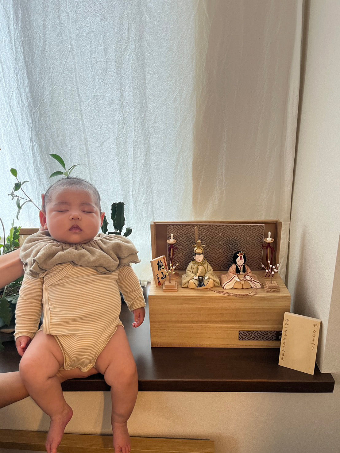 「娘の寝顔とお雛様のお顔がリンク」